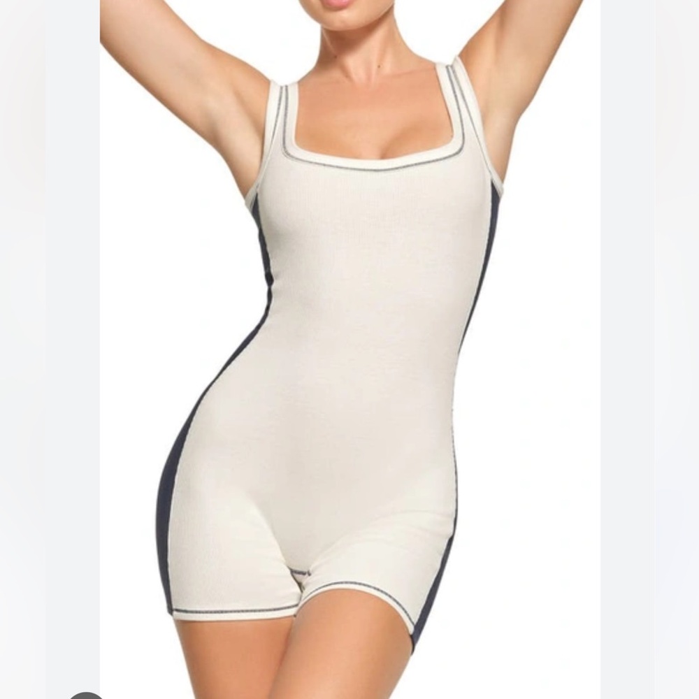 brand new without tags skims romper in marble/navy.